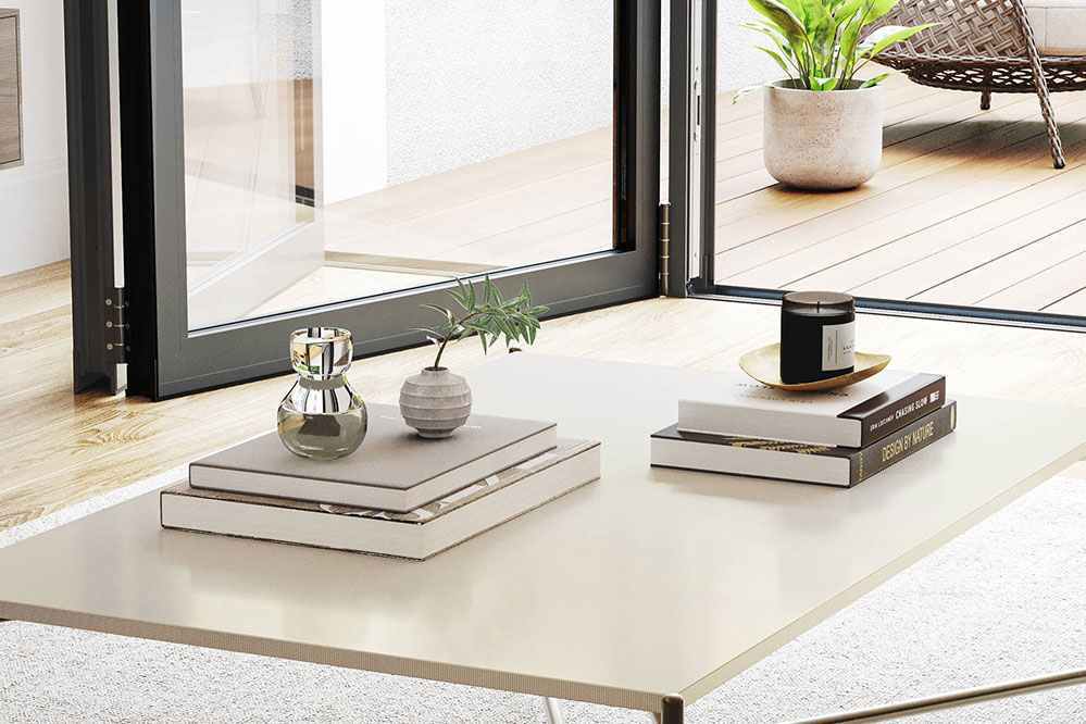 Corner-opening bi-fold door installation connected to a garden