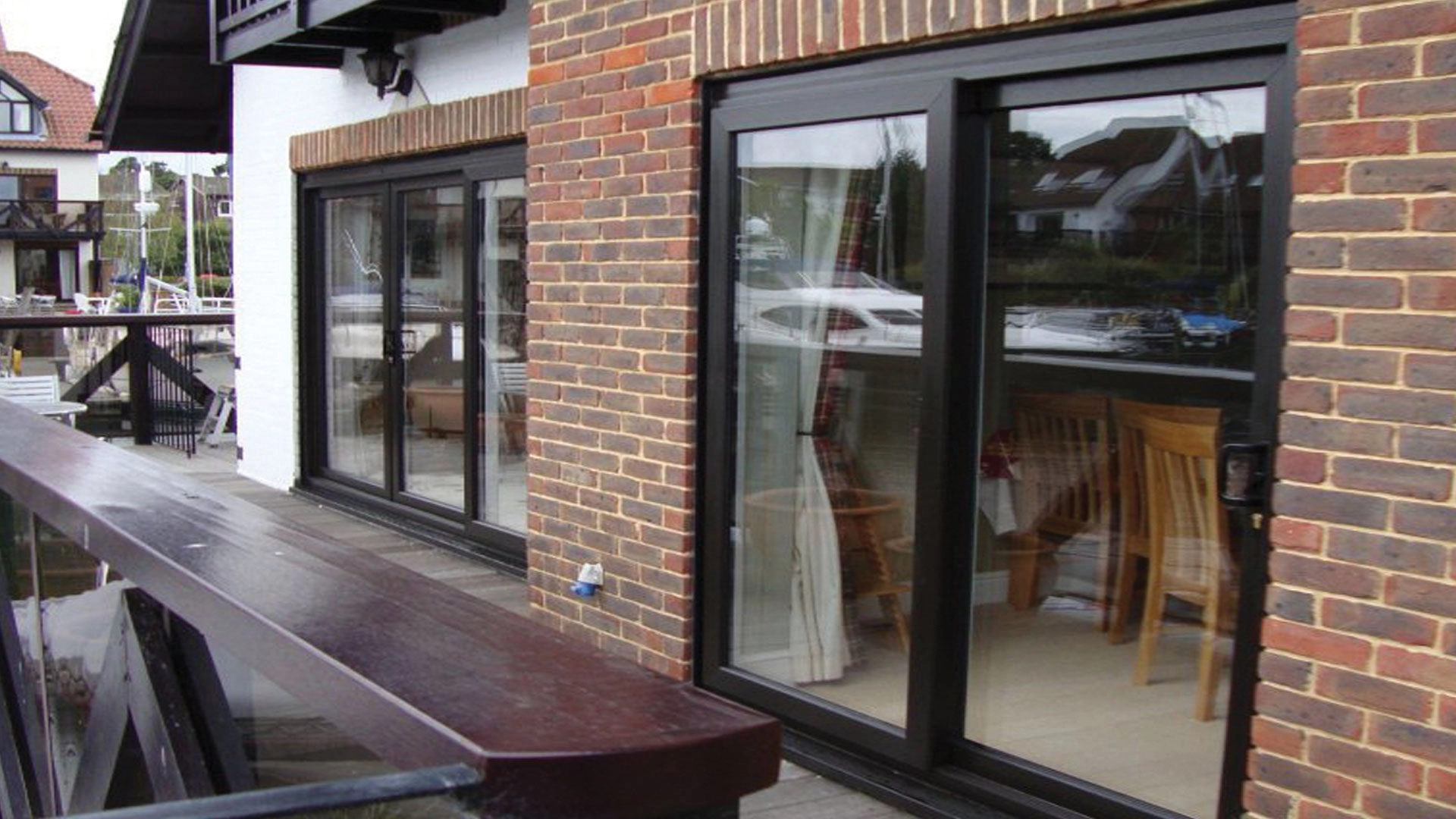 Large glazed patio door installation viewed from outside