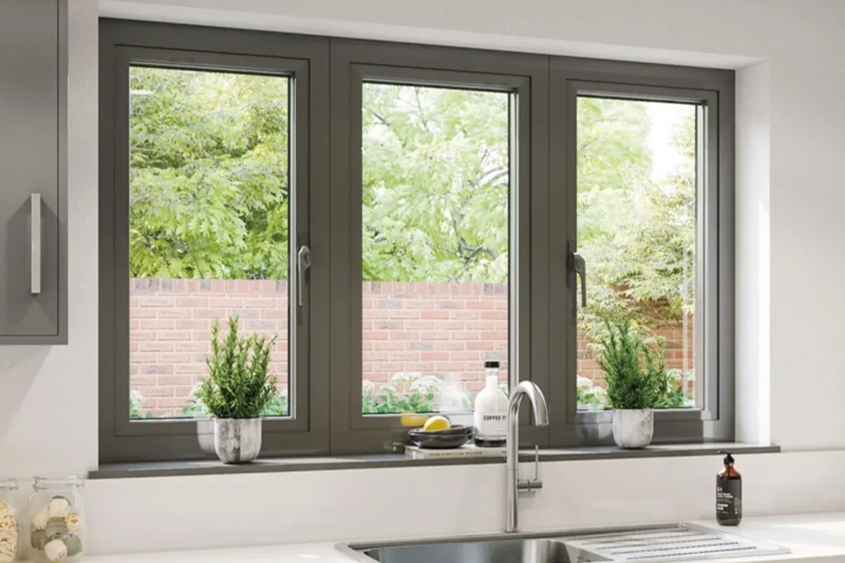 Modern kitchen with newly installed windows representing post-install comfort