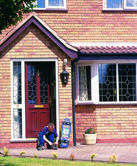 Edwardian-style front door with decorative glazing in side panels