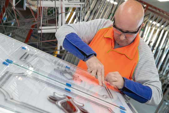 Decorative patterned glazing installation in a residential bay window