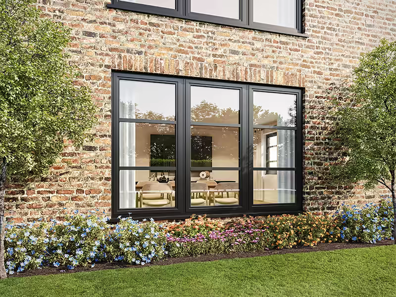 Large heritage aluminium window with slim sightlines and grille styling