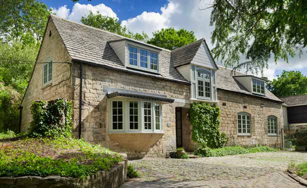 Close detail of heritage-style replacement window frame and glazing bars