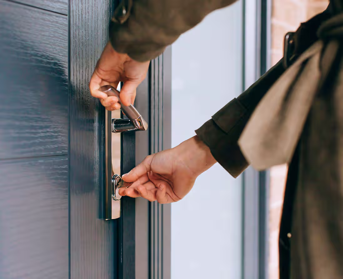 Traditional key lock operation alongside smart lock-status monitoring
